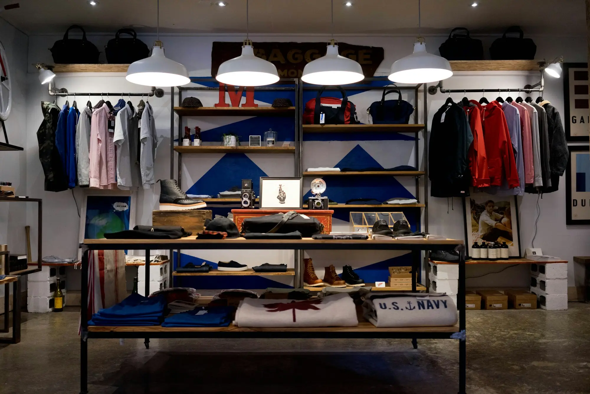 Interior of an independent clothing store with racks of stock ready for customers